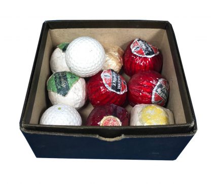 A Box of Early 19th Century Golf Balls Mostly Unused